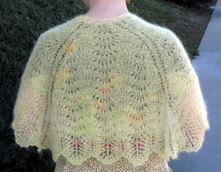 Mariposa Shawl knitting pattern by Cassie Castillo.  Feather and fan shawl with beaded lace border.