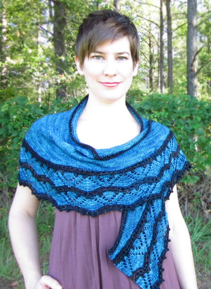 Djoser Shawl knitting pattern by Cassie Castillo.  Crescent Shawl with two color lace border with bobbles.