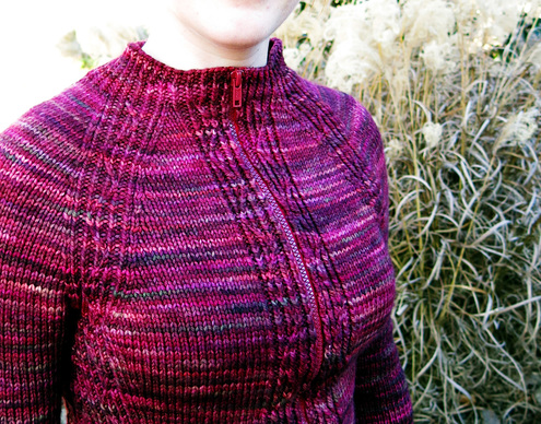 Lava Rock Cardigan knitting pattern by Cassie Castillo.  Bottom up raglan sweater with twisted stitches.