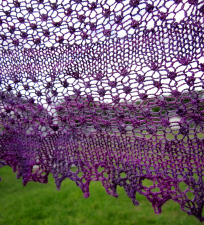 Blackberry Mist Shawl knitting pattern by Cassie Castillo.  Striped lace triangle shawl 