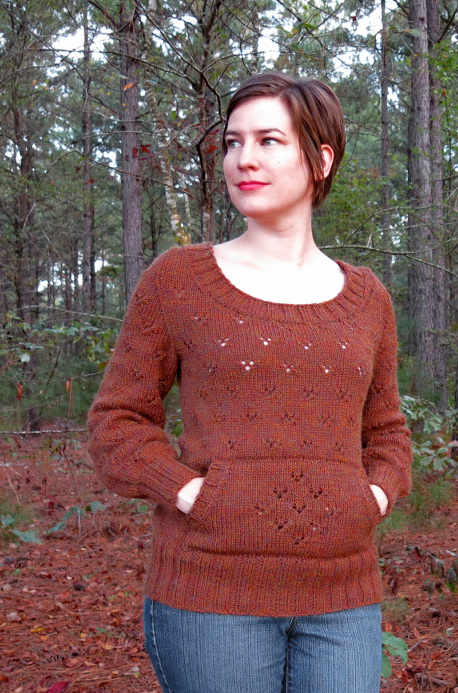 Starbrook Pullover knitting pattern by Cassie Castillo.  Scoopneck sweater in lace stitch pattern with kangaroo pocket.  