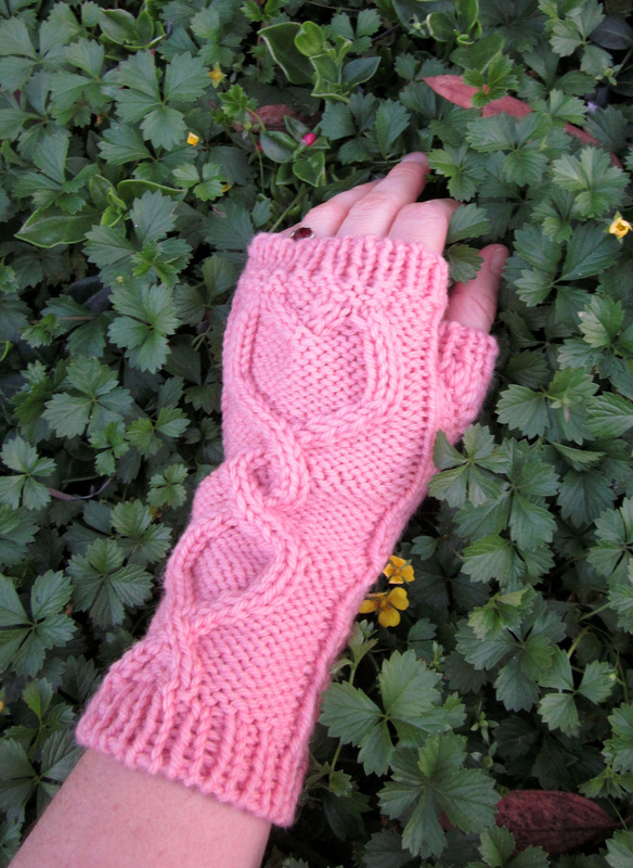 Cabled Heart fingerless gloves knitting pattern by Cassie Castillo