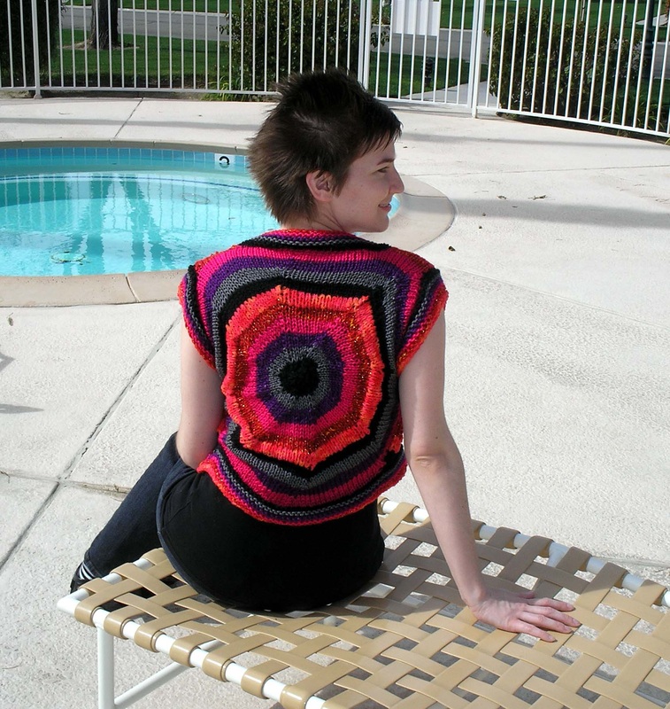 Morroco Vest by Cassie Castillo.  Striped vest worked from the center out.