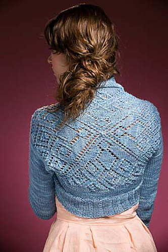 Camellia Shrug by Cassie Castillo.  Lace counterpane shrug worked from the center out.