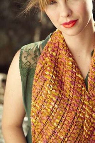 Lilka Scarf knitting pattern by Cassie Castillo.  Bias knit in cable and lace stitch pattern.