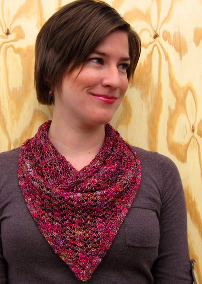 Rosewood Cowl knitting pattern by Cassie Castillo.  Triangle cowl worked flat in cables and lace.