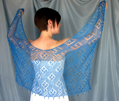 Ciara Shawl knitting pattern by Cassie Castillo.  Lace shawl with beads and picot edge.