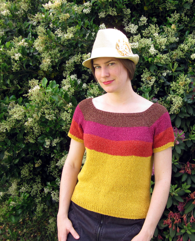 Sunburst Tee knitting pattern by Cassie Castillo.  Top down raglan sweater worked in color blocks.